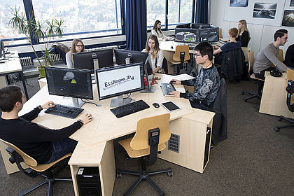 Several students work together in the Multimedia and Virtual World Lab 