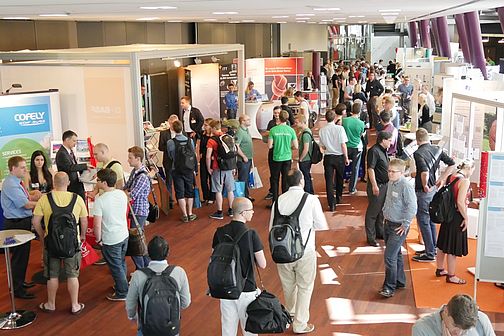 Promotional booths of the university Esslingen - view on many interested humans