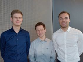 Portraitfotos von drei Studenten