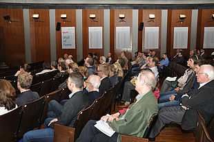 Listeners gathered in the auditorium