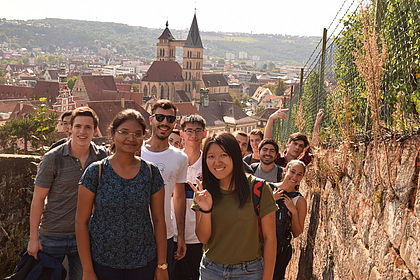 international students at the castle, in the background you can see the city church of Esslingen