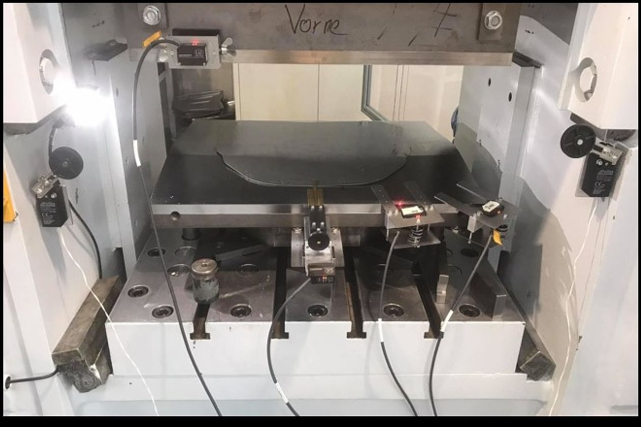 Experimental tool model engine hood with draw-in sensors