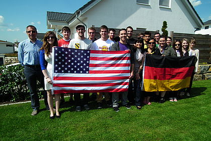 Prof. Christof Wolfmaier (left) welcomes the exchange students from Kettering University Flint, USA at a cook-out event in his garden. Picture: Esslingen University