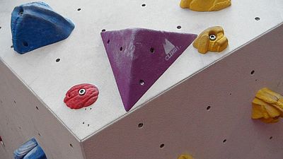 Photo as zoom on a climbing wall 