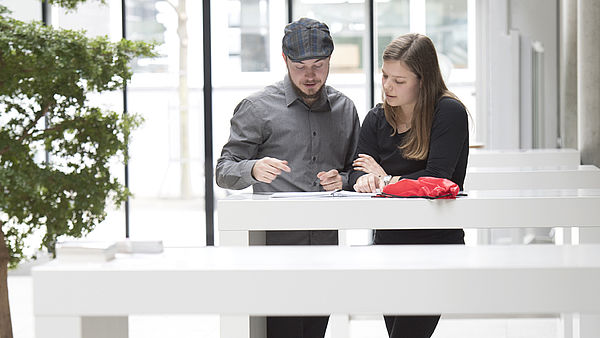 Two students prepare for a job interview 