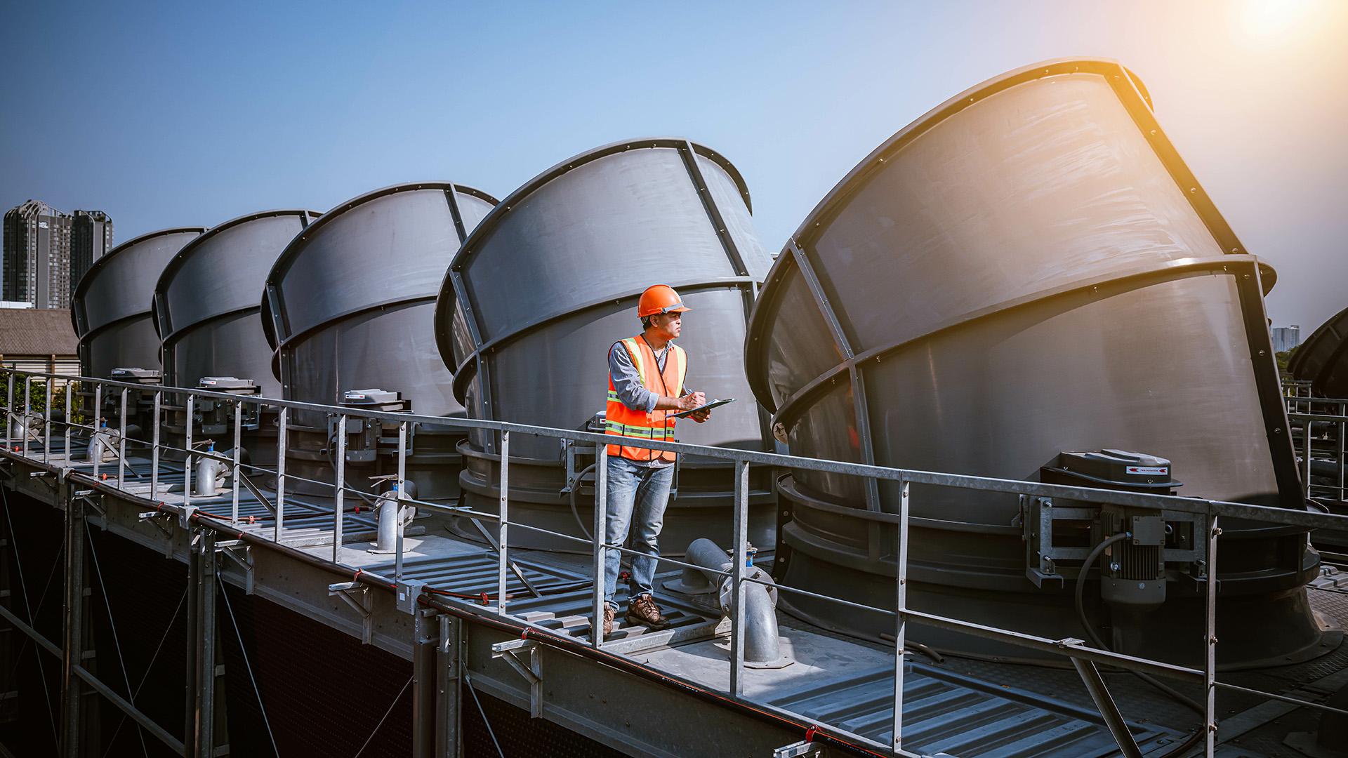 An engineer checking an air-conditioning system Copyright information: APchanel stock.adobe.com